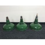 Three mid-20th century enamelled industrial light fittings
