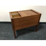 A mid 20th century teak shutter topped filing chest
