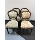 Four antique mahogany dining chairs