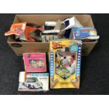 A box of boxed Robot radio, vintage Speed Flippers pin ball game, Matchbox modelling kit,