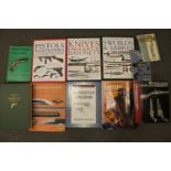 A box containing a good collection of militaria reference books; History of Colt Firearms,