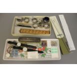 Two trays containing; silver-backed brush, six pewter napkin rings,