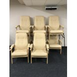 Eight beech framed high backed armchairs