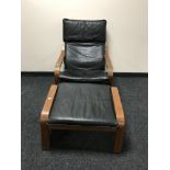 An Ikea beech framed armchair and footstool
