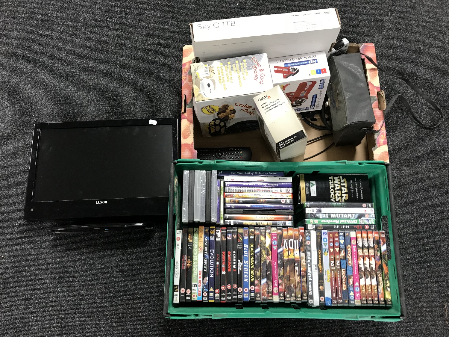 A box of assorted DVDs and CDs, box of Sky box, digital camera,