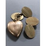 A pair of 12ct gold back and front cuff links and a 9ct back and front heart locket
