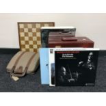A case of LP records, vintage typewriter, chess board, bathroom cabinet,