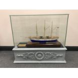 A scratch-built model - Mercator tall ship, contained within a glazed display case on stand,