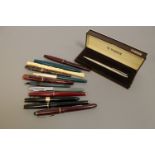 A collection of writing utencils to include; Parker '17' fountain pen,