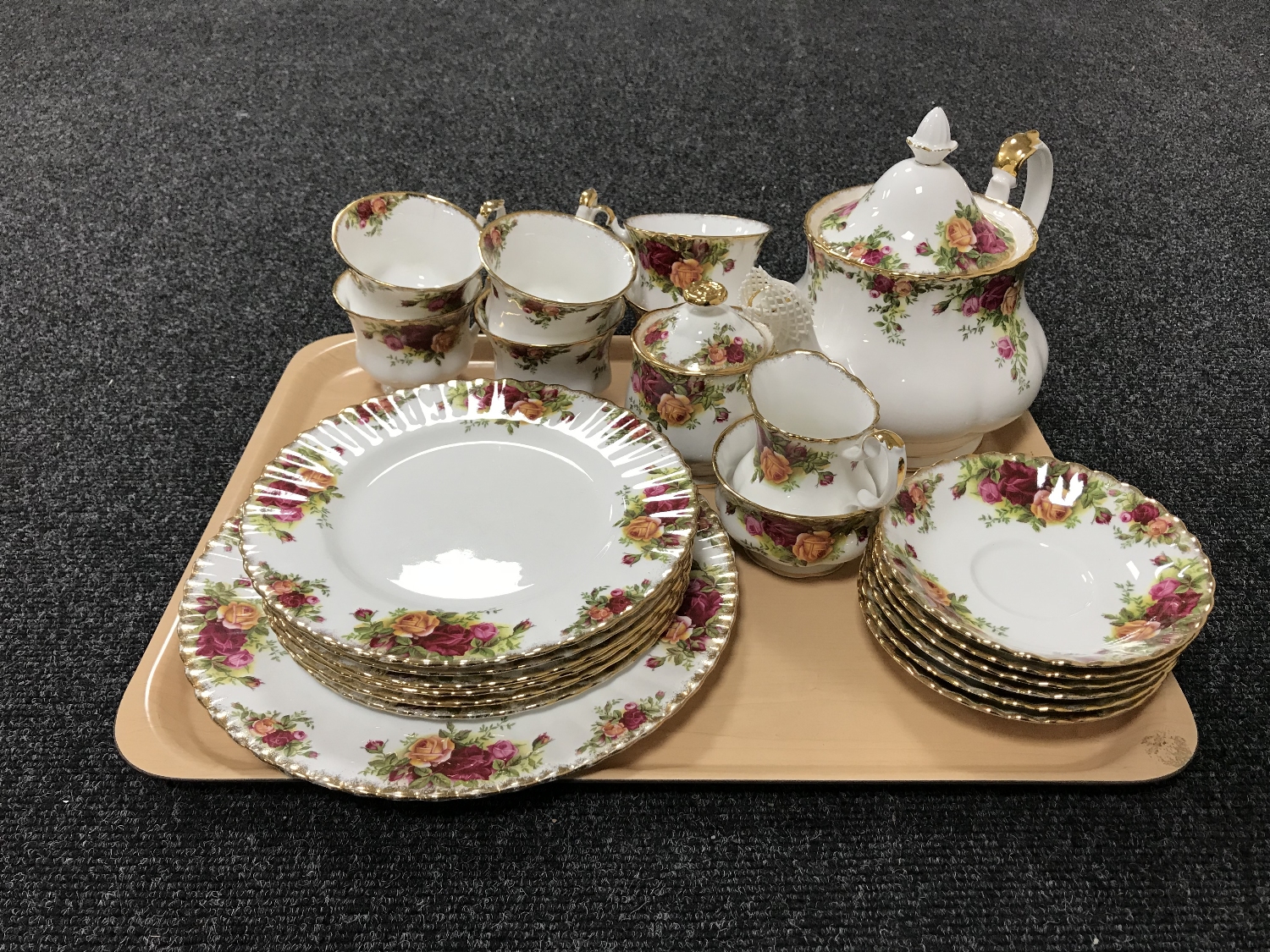 A tray of twenty-three pieces of Royal Albert Old Country Roses china