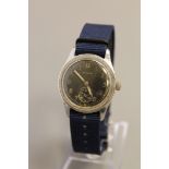 A WWII Period Military Wristwatch, signed Timor, 17 jewel adjusted lever movement,
