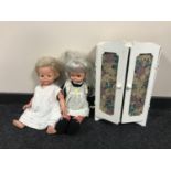 A box of two mid 20th century dolls and a painted doll's wardrobe