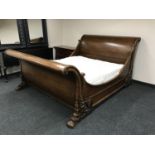 A heavily carved 6' scroll end sleigh bed together with ViSpring mattress CONDITION