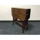 A Victorian inlaid mahogany Sutherland table