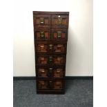 A eight drawer contemporary narrow chest