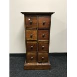 An Indonesian hardwood eight drawer chest