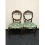A pair of Victorian drawing room chairs