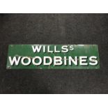 A mid 20th century Wills Woodbines enamelled sign