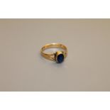 An 18ct gold sapphire ring, size O. CONDITION REPORT: The sapphire measures 7.