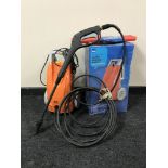 A boxed B & Q electric pressure washer