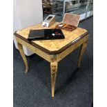 A contemporary gaming table fitted with roulette wheel, back gammon board,