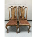 Four oak dining chairs