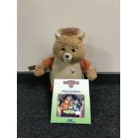A vintage Teddy Rukspin bear with accompanying book and cassette tape CONDITION REPORT: