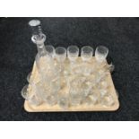 A tray of crystal glasses together with tankards and decanter