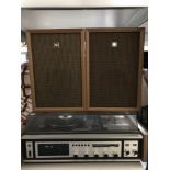 A Sanyo music system with teak cased speakers