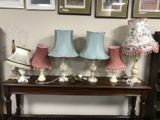 Three pairs of marble table lamps together with an odd marble lamp (7)