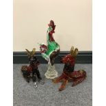 A mid-0th century glass figure of a cockerel and two glass dog figures