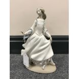 A Lladro bisque figure of Cinderella,