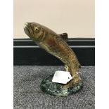 A Beswick figure of a leaping trout,