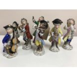 A group of seven Sitzendorf monkey band players, height 14 cm.