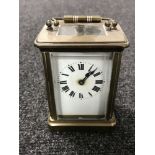 A French brass carriage clock with key