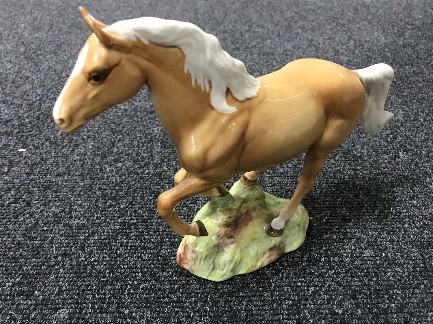 A Beswick horse - galloping horse, model 1374, palomino,