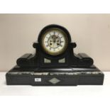 A Victorian slate mantle clock with gilt and enamel dial