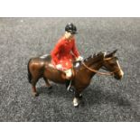 A Beswick figure - huntsman on a brown horse, model 1501,