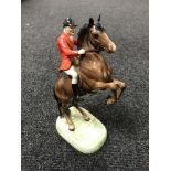 A Beswick figure - huntsman on a rearing horse, second version,