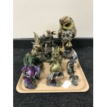 A tray of dragon ornaments and figures,