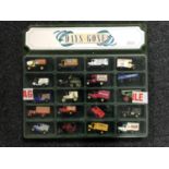 A Days Gone by plastic fronted display case containing twenty die cast delivery vans