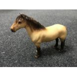 A Beswick horse - Highland pony, model 1644, dunn,