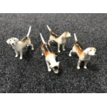 Four Beswick hounds