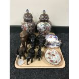 A tray of seven carved wooden elephants, pair of contemporary chinese vases,