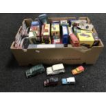 A box of die cast vehicles including classic sports cars, motorbikes,