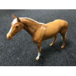A Beswick horse - Bois Roussel racehorse, model 701, palomino,