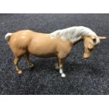 A Beswick figure - Model 1812 Mare (facing right, head down), palomino,