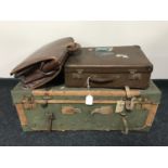 A vintage luggage case with leather trim together with a mid twentieth century suitcase and leather