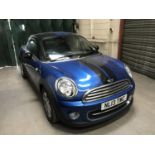 A Mini Cooper Coupe motorcar, registration NL13 TWC, 12,206 miles, first registered 28.03.