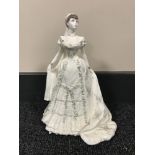 A Coalport commemorative figure- Queen Mary 3055/7500